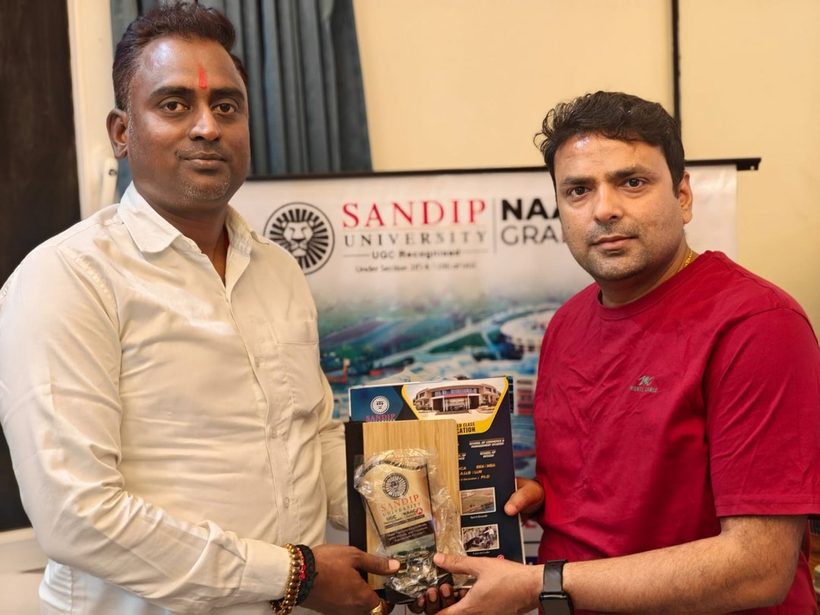 Director Saket Kumar with an official of Sandip University during an institutional visit